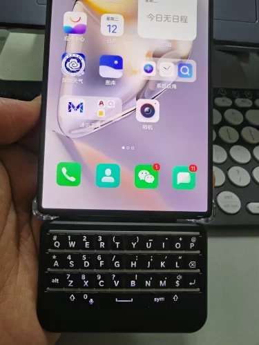 Click to view full screen BBQ10KBD Mini Berry Keyboard photo review