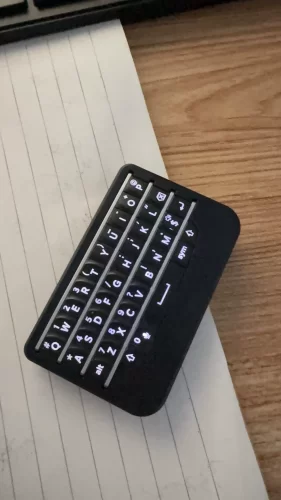 Click to view full screen BBQ10KBD Mini Berry Keyboard photo review