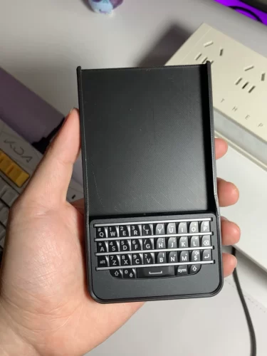 Click to view full screen BBQ10KBD Mini Berry Keyboard photo review